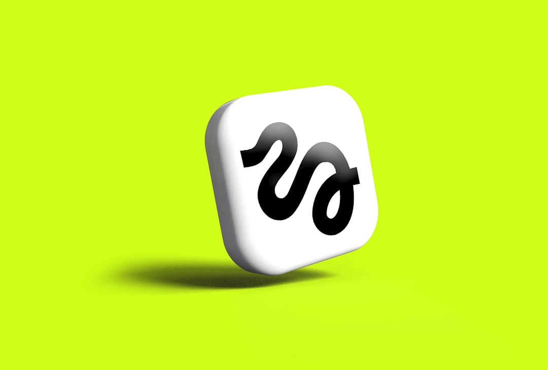 a-white-icon-with-a-black-snake-like-symbol-janazkssp5w